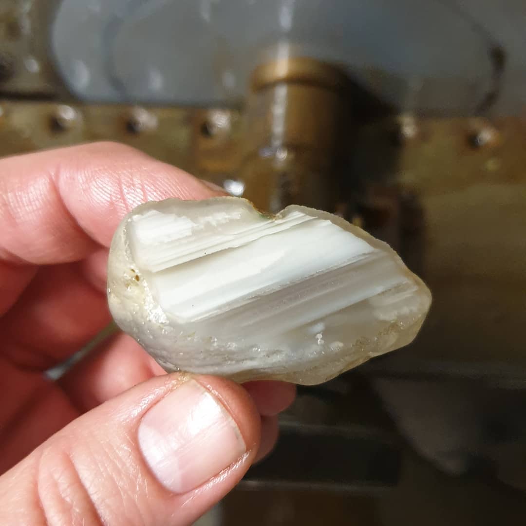 First cut with my lapidary saw I have been fixing up. Super smooth cut! It should polish up really easily! Its amazing how solidly built this little 10" saw is. It has a power feed which gives a really consistent finish. 

I have some petrified wood I've been wanting to cut as well as a couple of damaged nautiloids 🤞

          